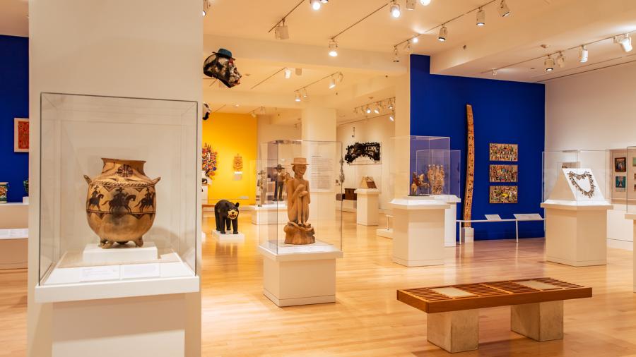 Art gallery room with displays under protective glass
