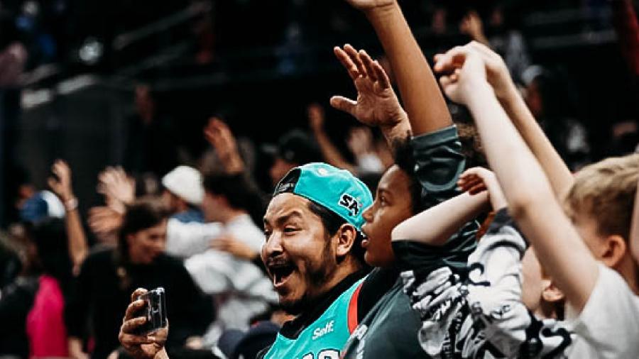 fans cheering at spurs game
