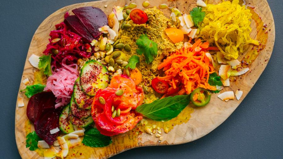 Overhead view of different foods on cutting board