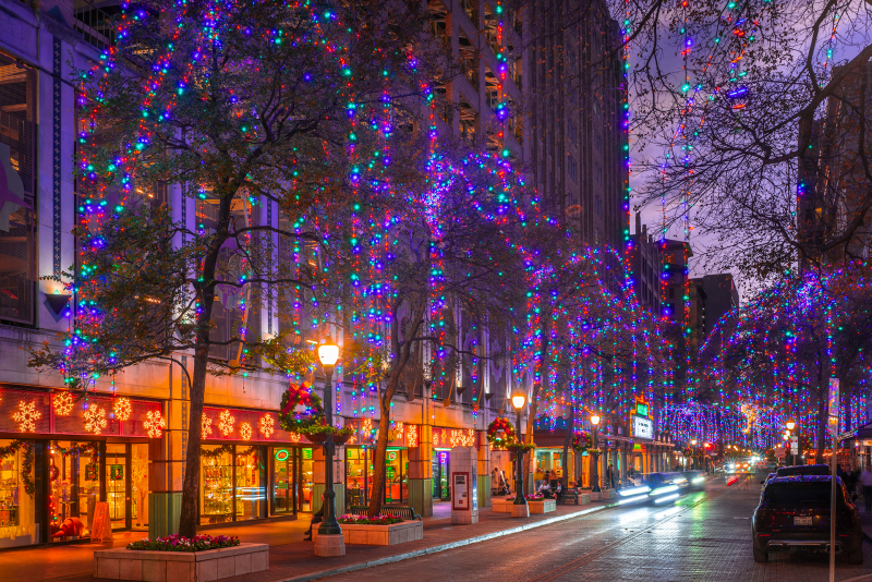 Houston Street in San Antonio adorned with holiday lights and wreaths.