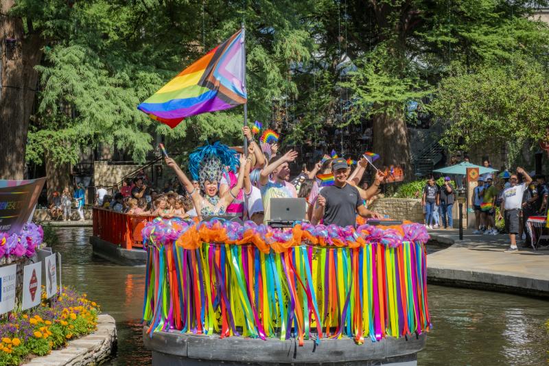 River barge filled with people celebrating