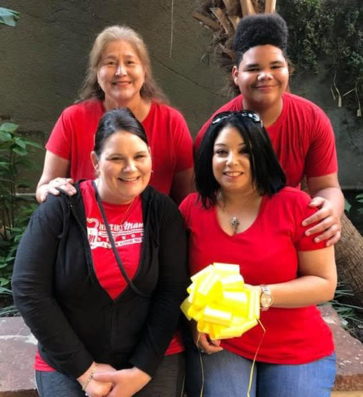 Group of event volunteers dressed in red