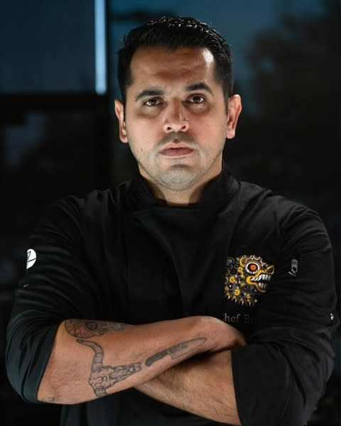 Chef with hands crossed over chest