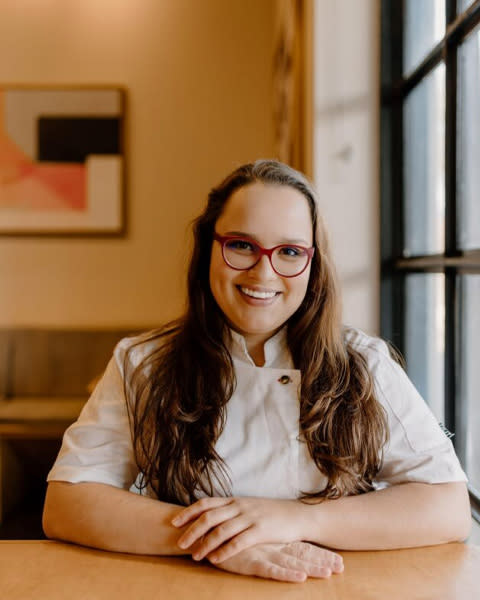 Chef sitting at table