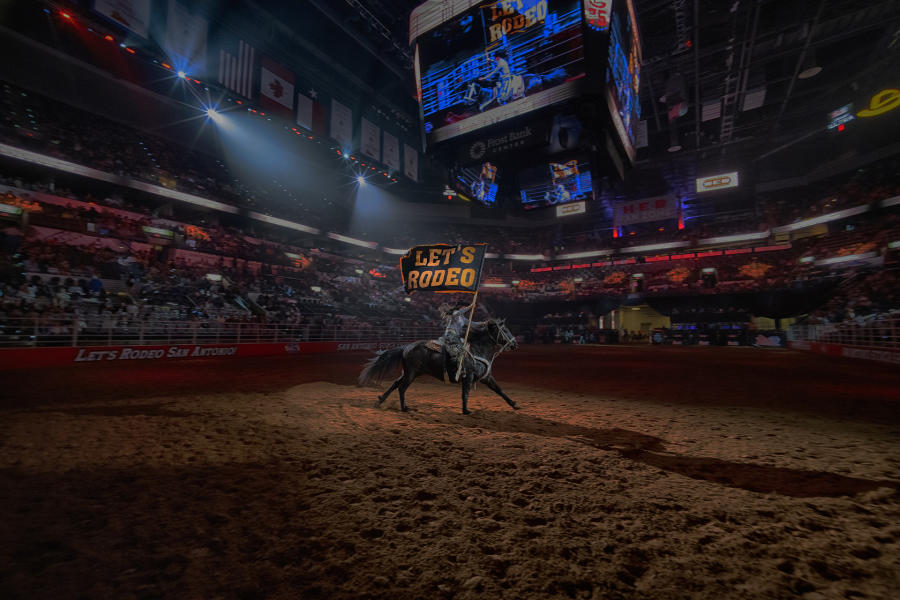 San Antonio Stock Show and Rodeo Horse Rider with "Let's Rodeo Flag"