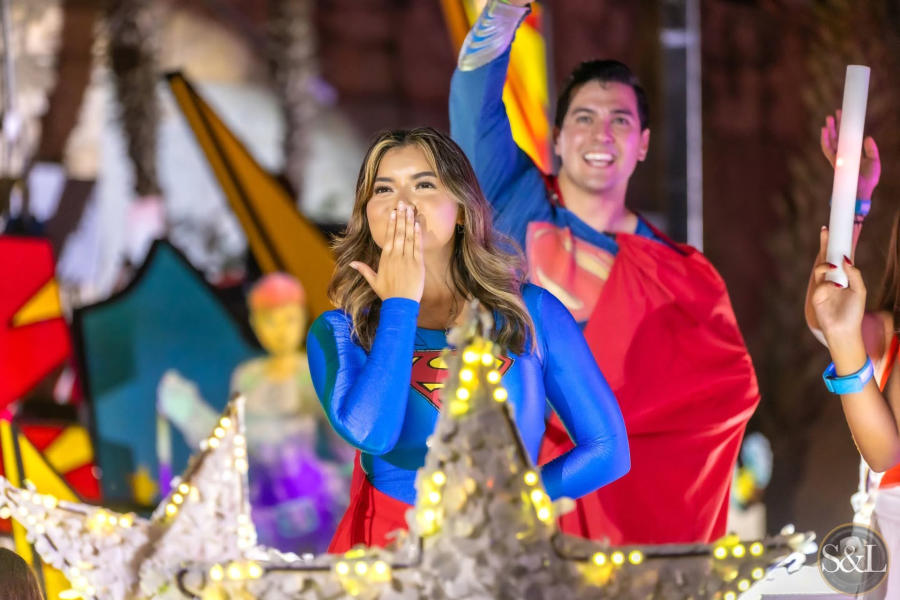 Woman in Superwoman Outfit during a parade