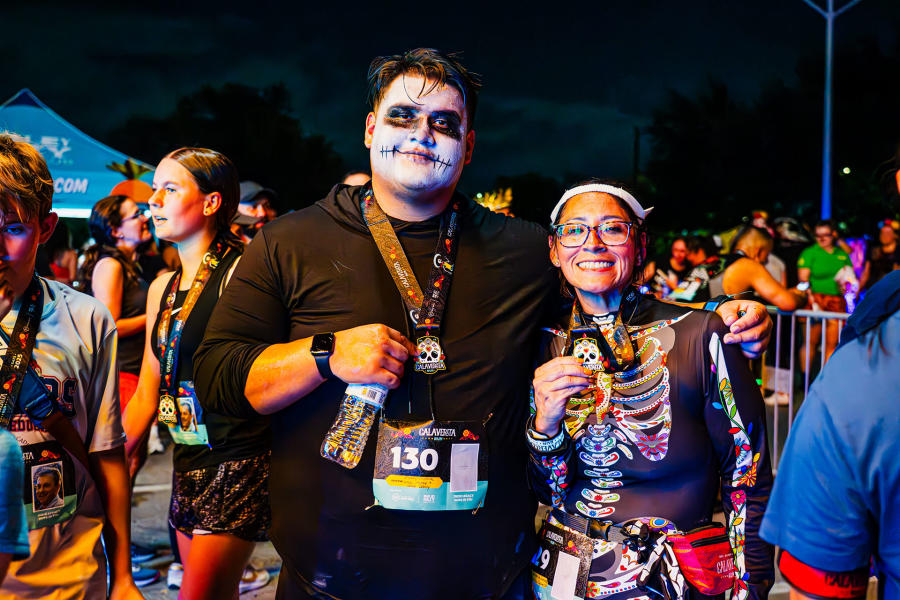runners posing for a photo at the 2025 Calaverita Run