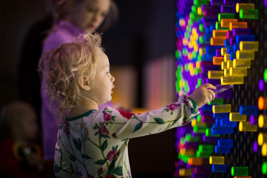 children interacting with exhibit at Doseum