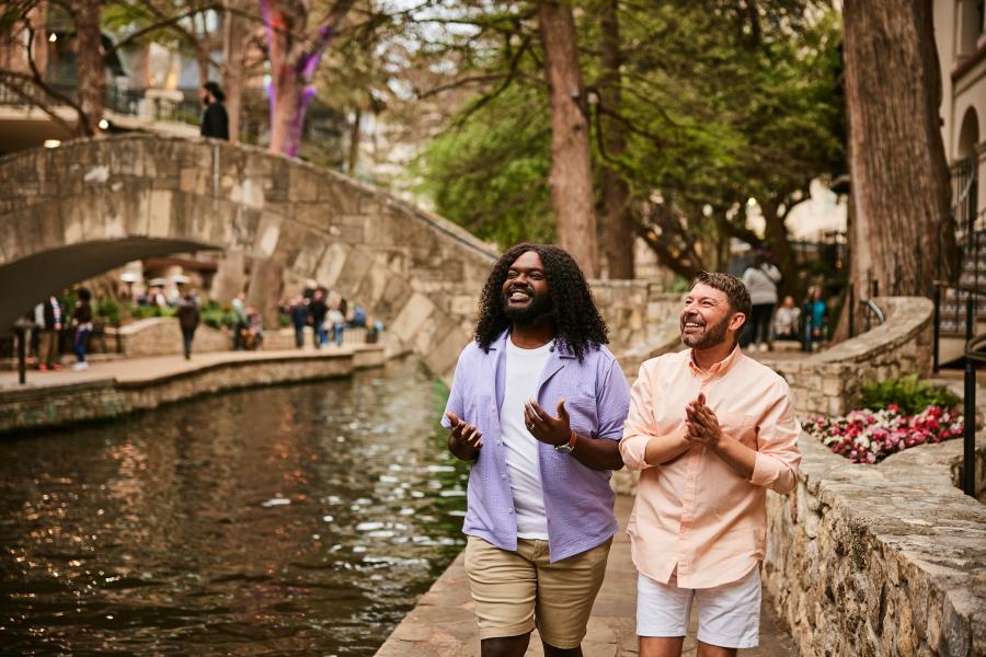 Couple walking down River Walk