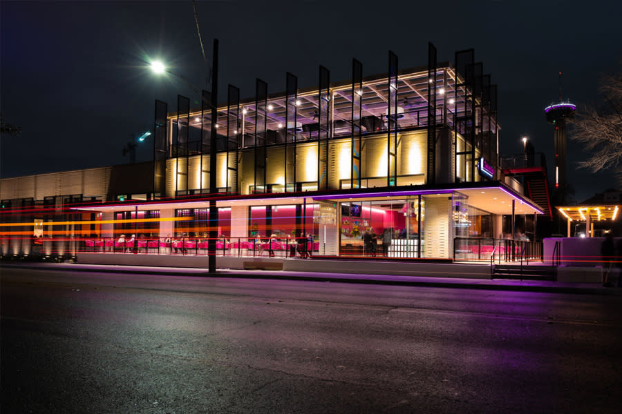outdoor view of restaurant with Tower of Americas in background