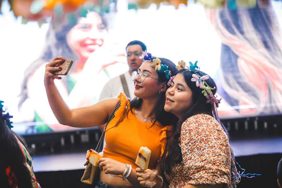 Two girls posing for photo