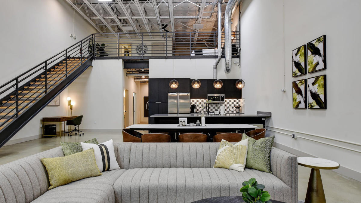Living room view of rental with staircase