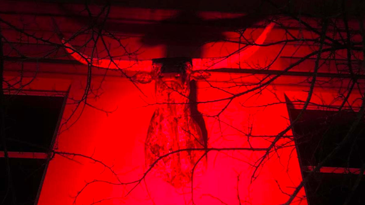Longhorn head lit with red lighting