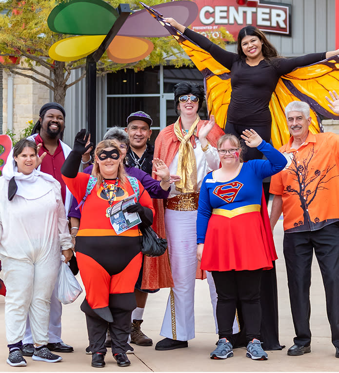 Group of people dressed in Halloween costumes