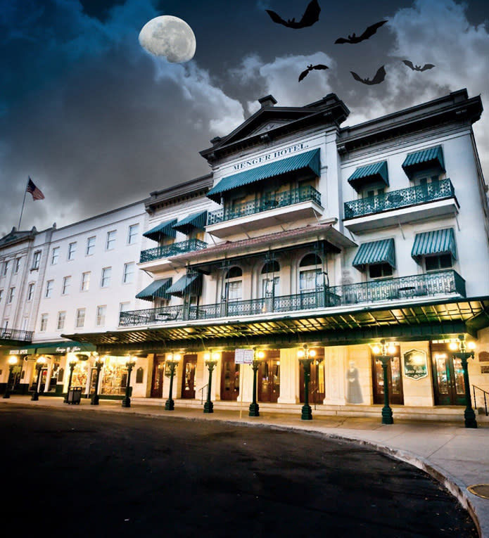 Menger hotel with spooky moon and bats flying in the background