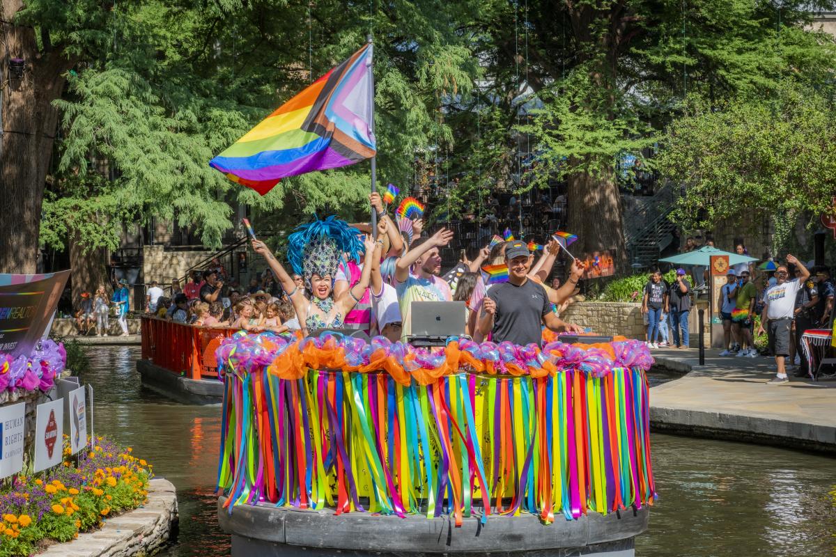 River barge filled with people celebrating