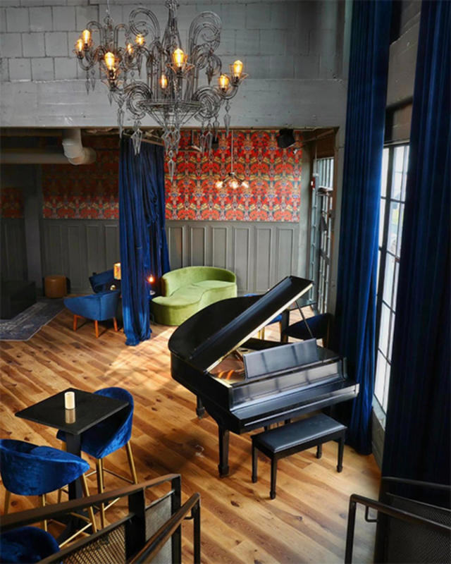 Piano with blue chair