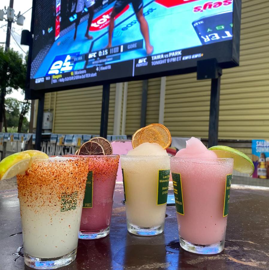 frozen margaritas in front of TV