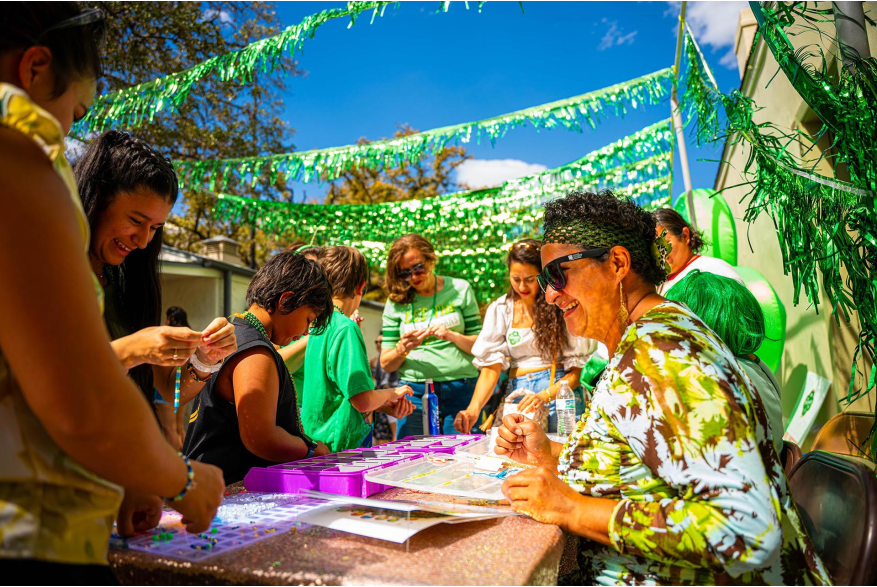 volunteers at river walk event helping guests