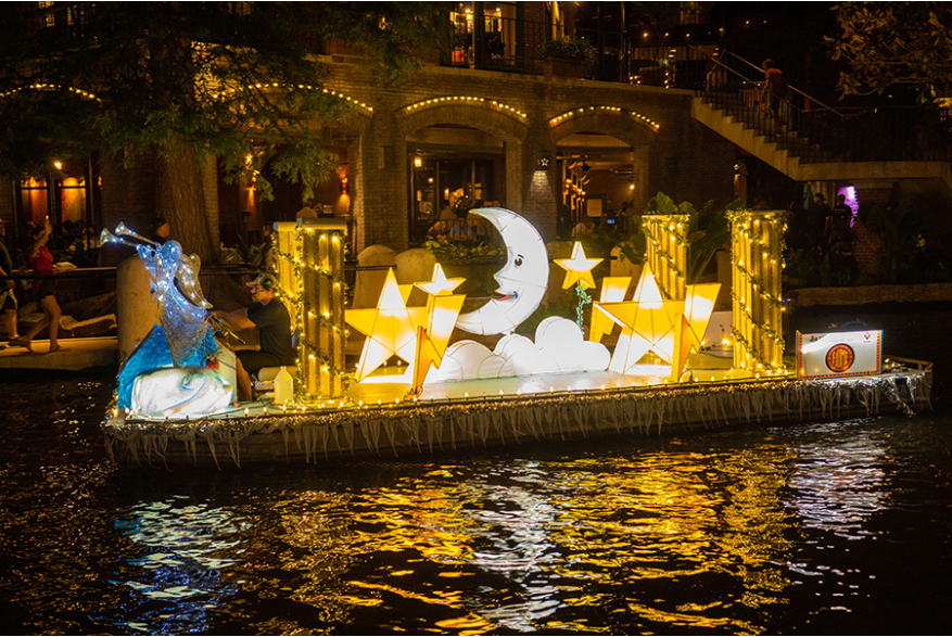 Moon and stars illuminated on river barge