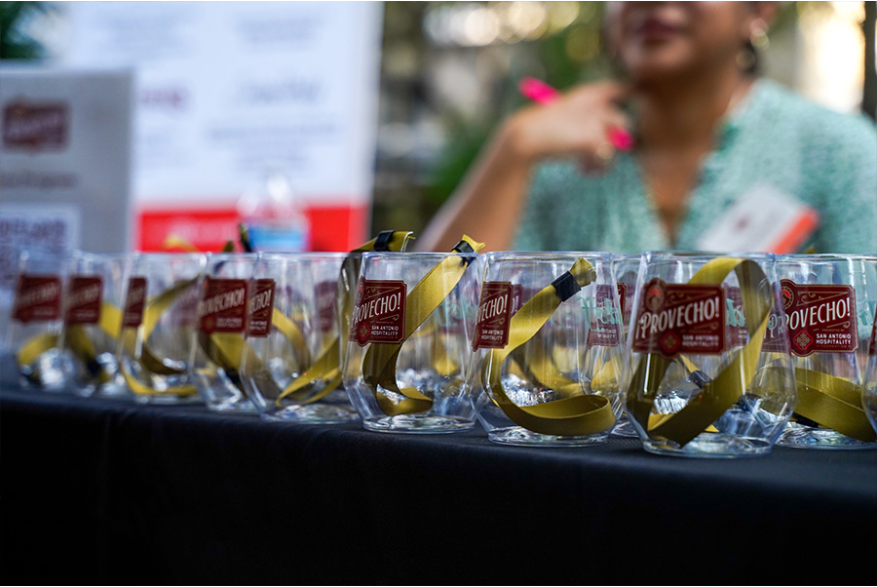 Glasses with Provecho logo and wristbands