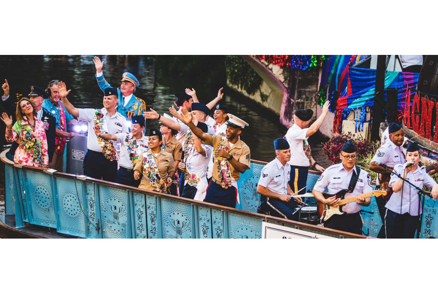 Service men and woman waving on river barge