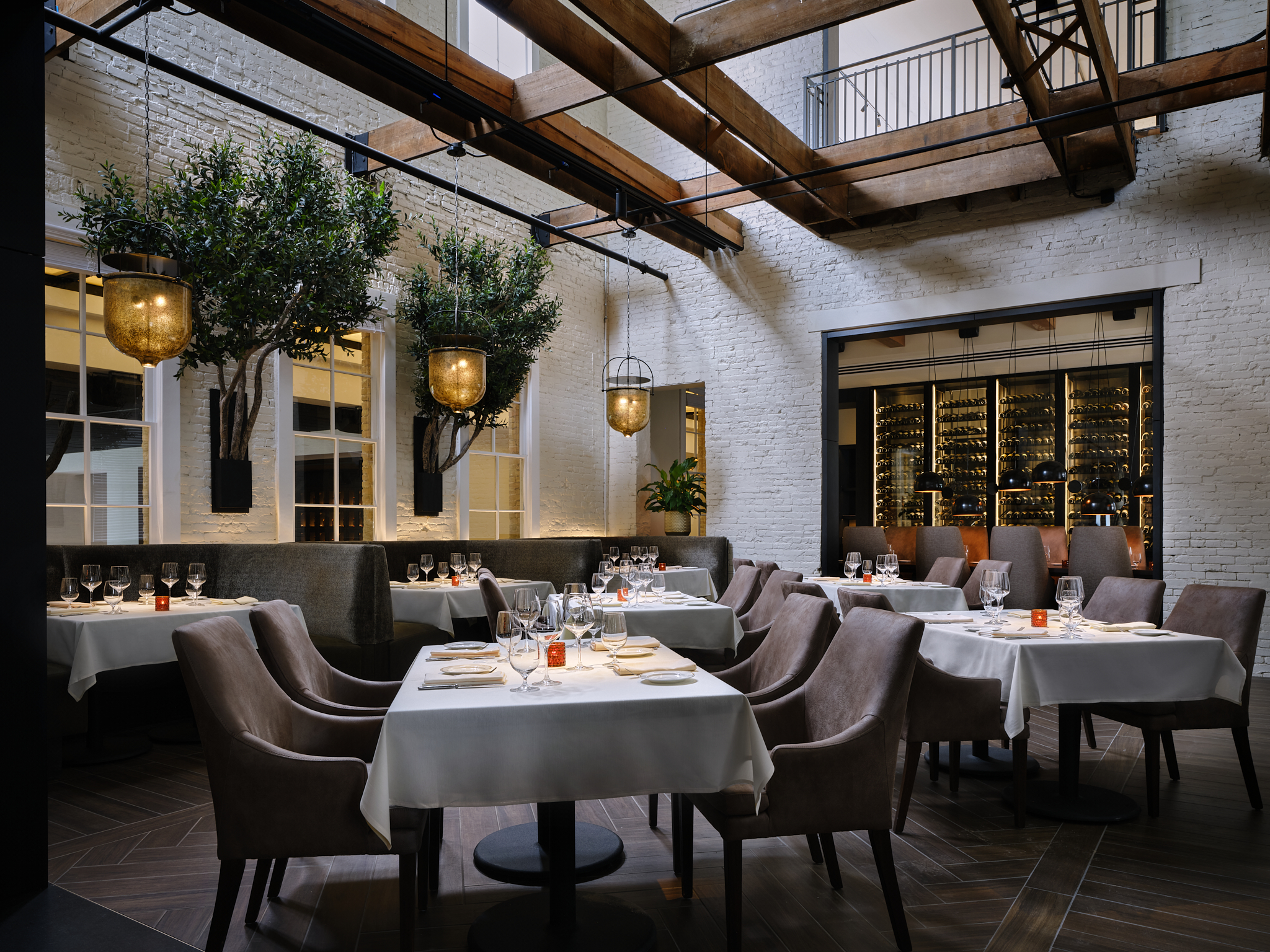 Dining area with classic settings at Kimpton San Antonio.