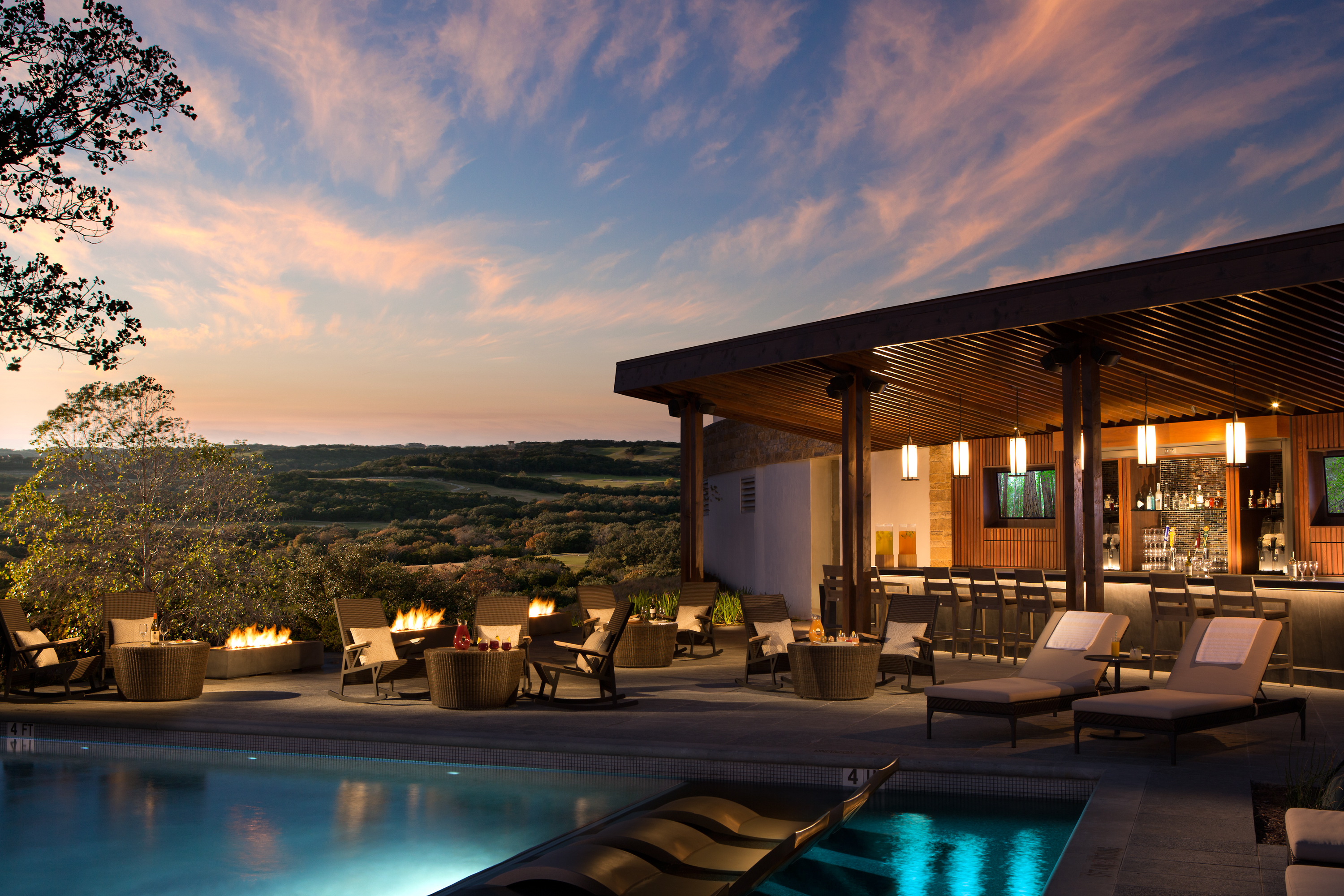 Exterior of Loma de Vida in San Antonio with sunset in background.