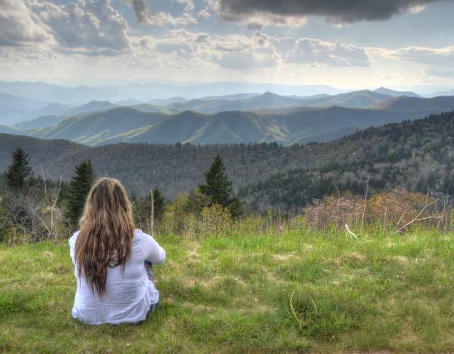 Person Viewing Mountain Scenery