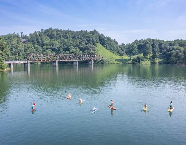 Canoes and paddleboards on the lake