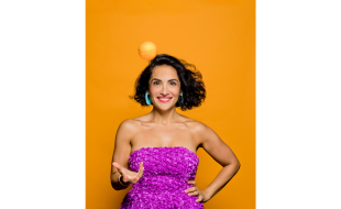 Sayeh Tavangar tossing an orange