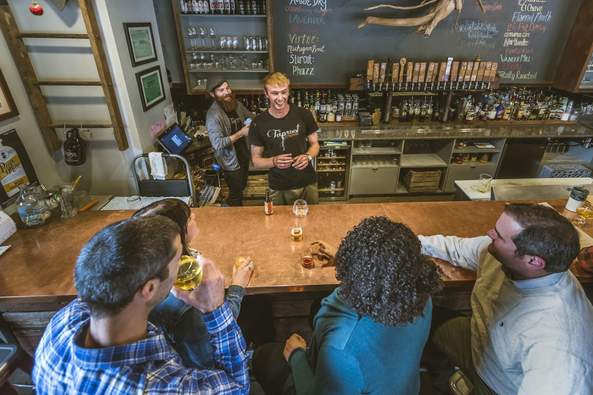 Group drinking cider at Taproot