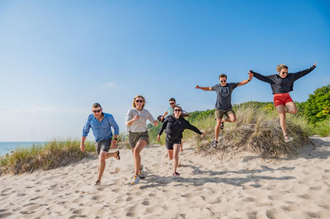 Group jump on the beach
