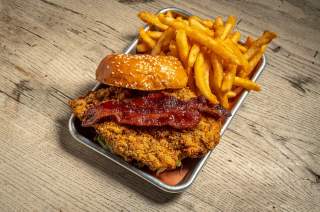 A meal consisting of a chicken sandwich and fries from Morgan's Brooklyn Barbecue in King of Prussia