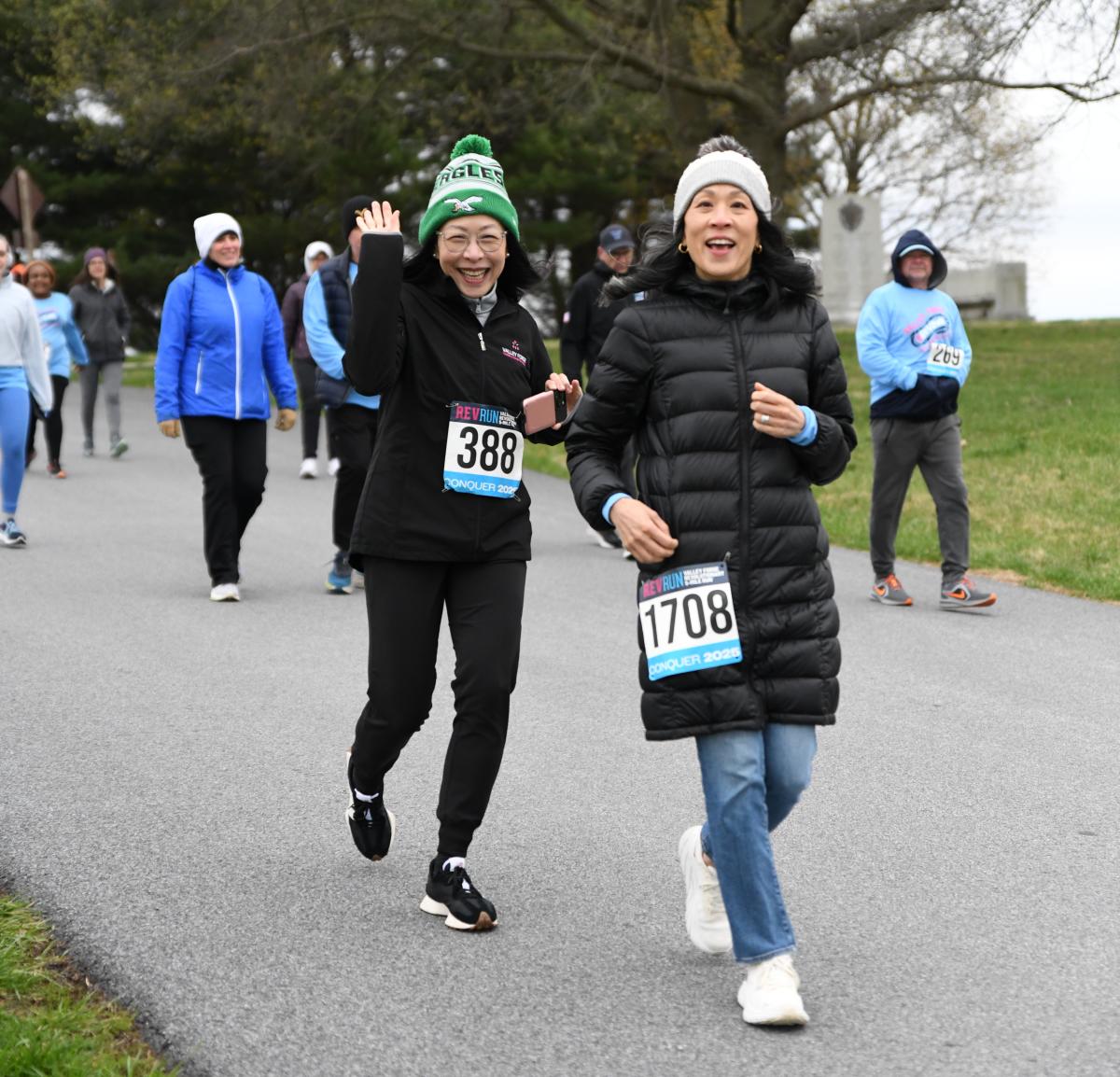 Walkers smile during the Rev Run 2-Mile Walk