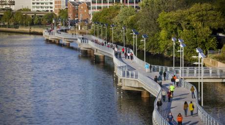 People walking and riding on the Schuylkill River Trail in Philadelphia