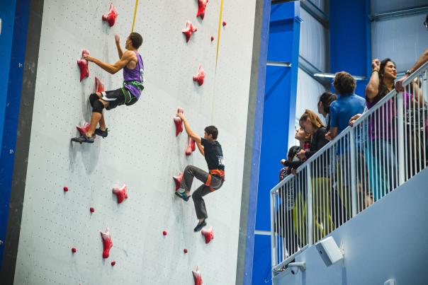 A Group Of people climbing the walls at Reach Climbing