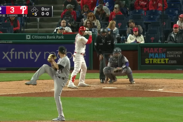 Bryce Harper at bat during the Phillies/Colorado Rockies game at Citizens Bank Park. Behind home plate is a Make it Main Street, Montgomery County Pa ad