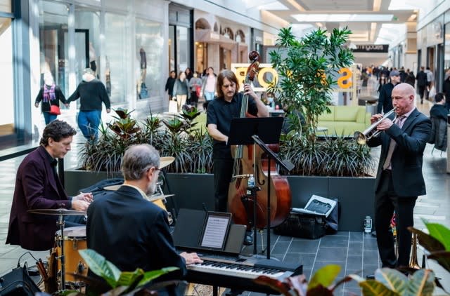Jazz180 plays in the mall courtyard