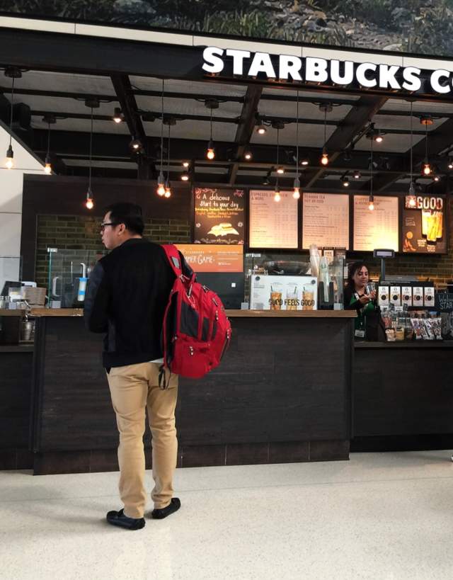 People enjoying Starbucks At DFW Airport