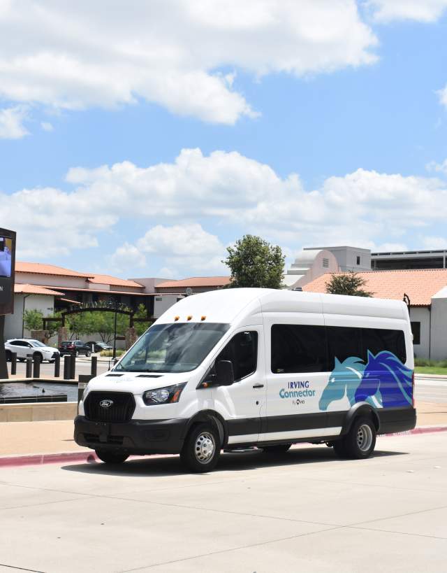The van parked outside of the Irving Convention Center