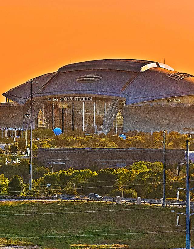 AT&T Stadium at sunset.