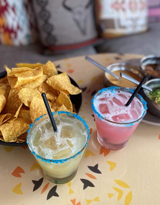 Two types of margaritas and chips with guacamole and salsa from Two Mules Cantina in Irving, TX
