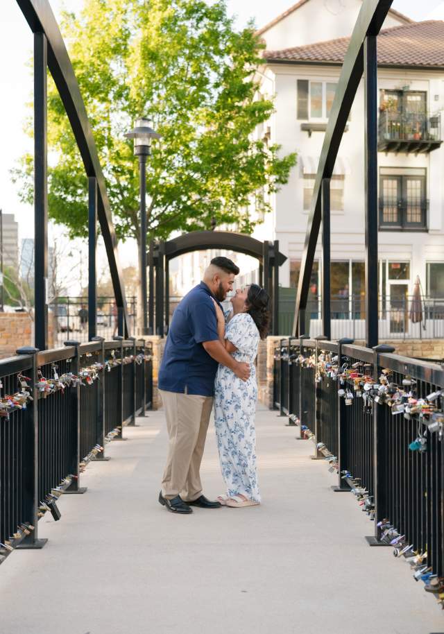 Couple posing at the Love Lock Bridge