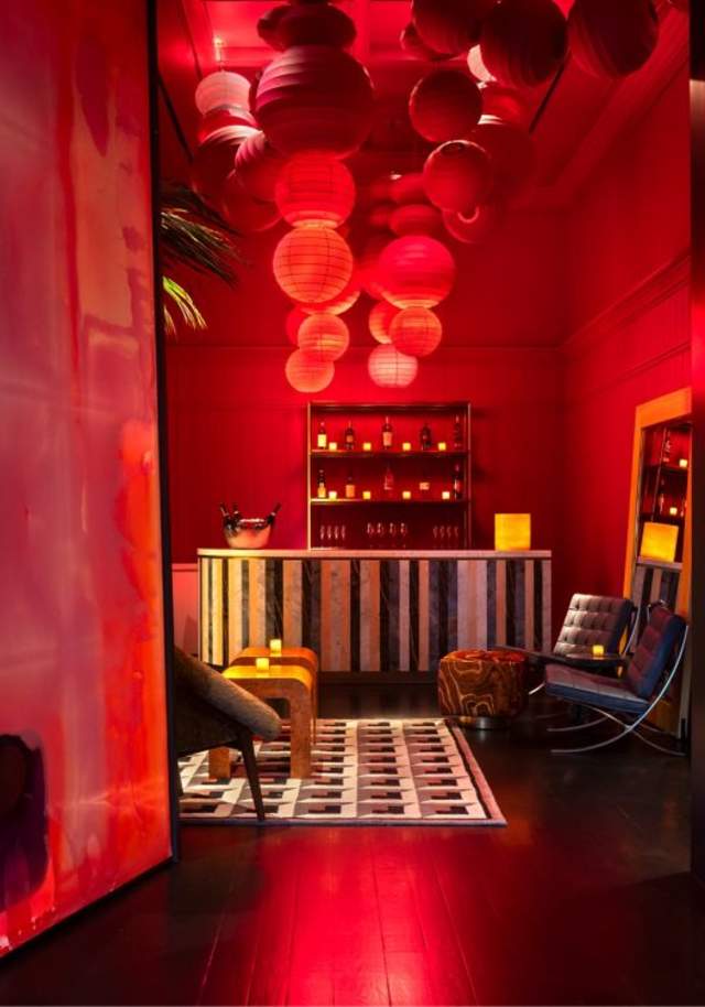 Red lighting and romantic ambiance in the Irving restaurant, Knife Italian Steak