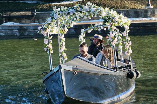 A couple in a flower-covered gondola with Gondola Adventures in Irving, TX