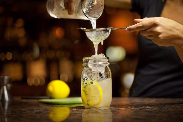 a drink being served in a glass