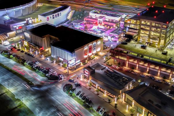 Aerial view of the Toyota Music Factory Entertainment District at night