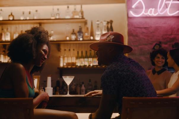 Couple enjoys drinks at the hotel bar of Texican Court