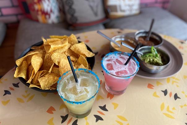 Two types of margaritas and chips with guacamole and salsa from Two Mules Cantina in Irving, TX